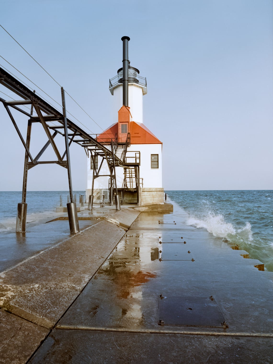 Lighthouse Surf At Lake Michigan