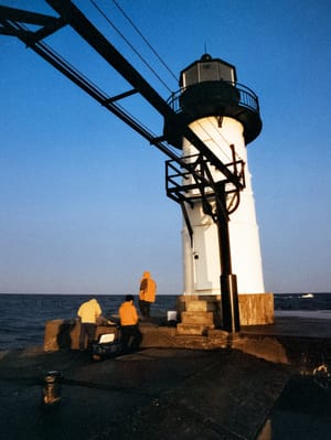 Fishermen At Dawn, St. Joseph Lighthouse
